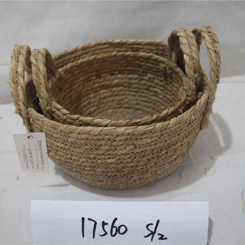 Cesta de paja para el vientre al por mayor personalizada, cesta de almacenamiento hecha a mano de ratán natural de pasto marino tejido con asas